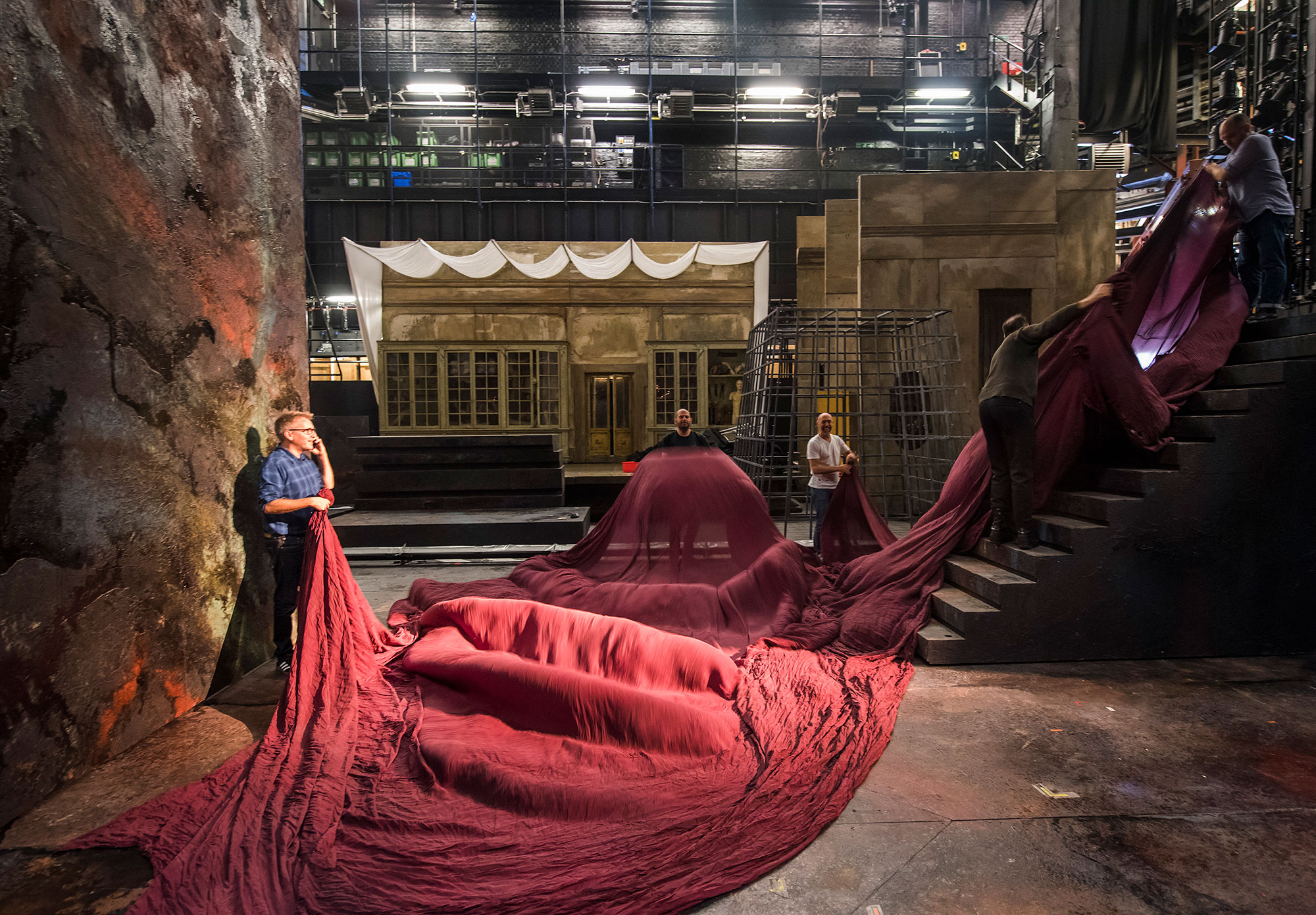 Set Designer Tom Pye with silk designs from Basil Twist.