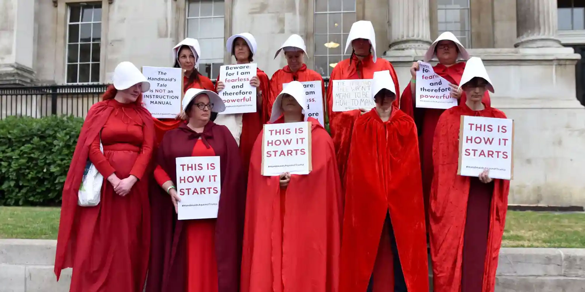 Image of a group of protestors dressed as Handmaid's from The Handmaid's Tale