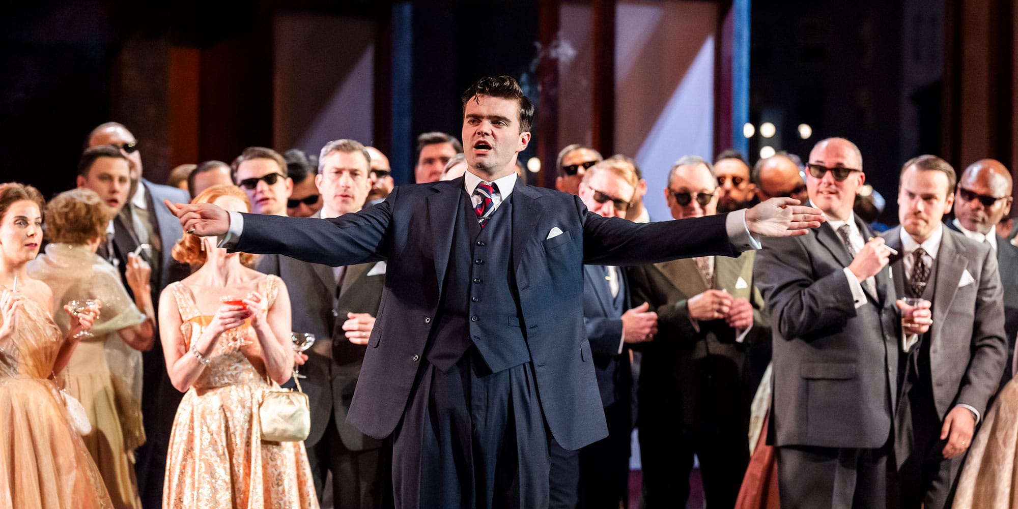Cast of rigoletto main man with arms out